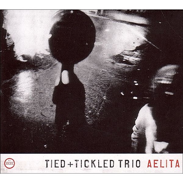 Aelita, Tied & Tickled Trio