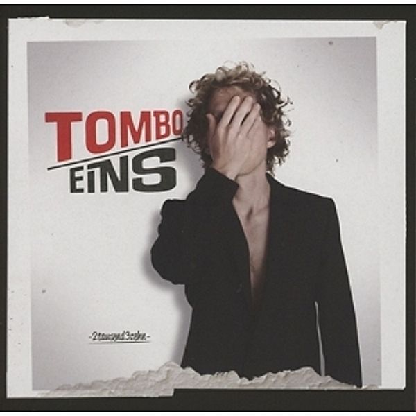 Eins, Tombo