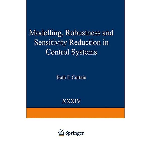 Modelling, Robustness and Sensitivity Reduction in Control Systems